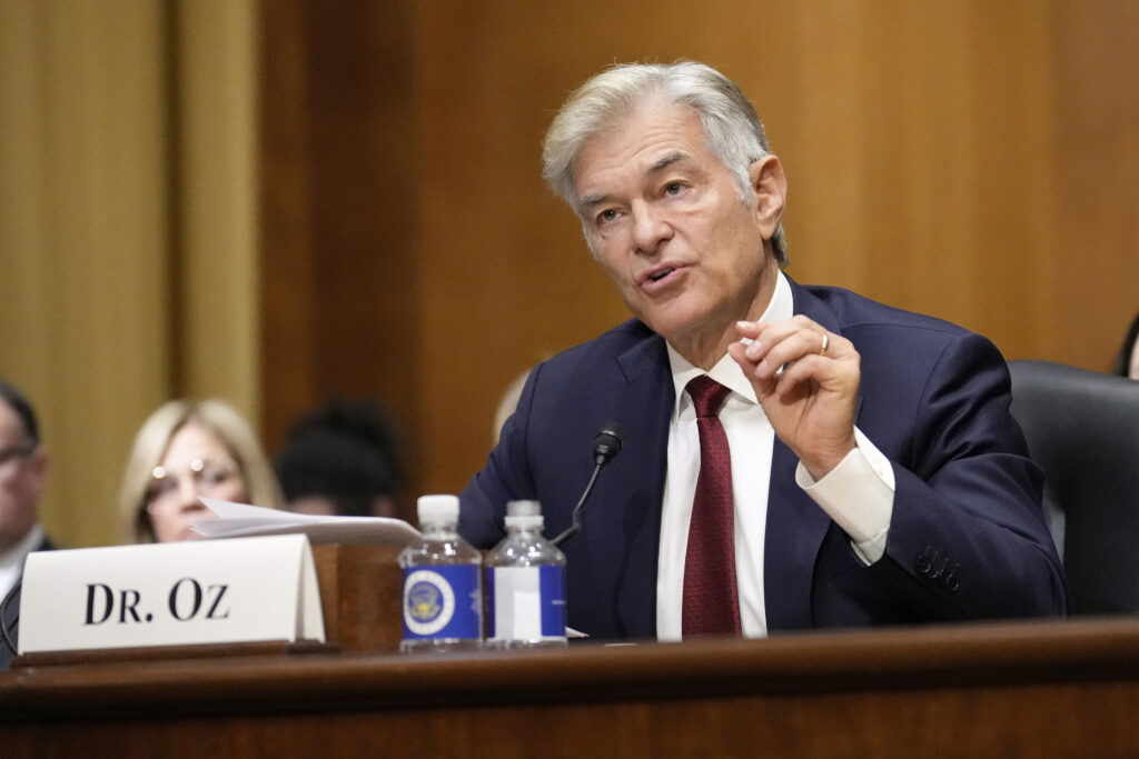 A photo of Dr. Oz testifying before the Senate.